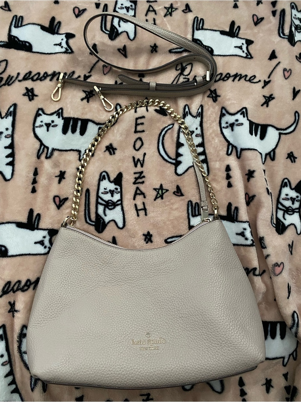 Kate Spade light tan shoulder and crossbody with gold hardware.